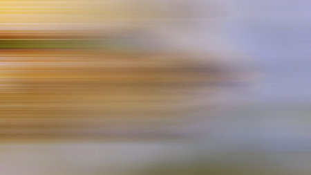 Light abstract gradient motion blurred background. Colorful lines texture wallpaper.