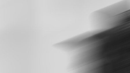 Light abstract gradient motion blurred background. Monochrome lines texture wallpaper