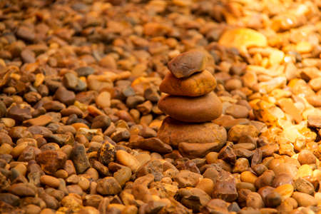 Brown smooth stone pebblesの写真素材