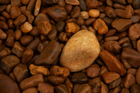 Brown smooth stone pebblesの写真素材