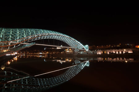 The newest bridge in Tbilisi, opened in 2010 is made of steel and glass, it is pedestrian so called Peace Bridge  Nowadays one of the controversial symbols of  modern  Tbilisi の写真素材