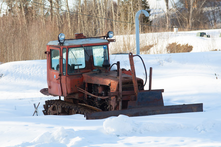 Old tractor in winter