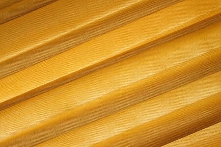 Warm textile texture backlit by the Sunの写真素材