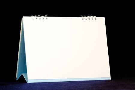 Real Desk Calendar on dark blue velvetの写真素材