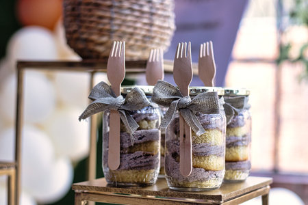 Vanilla cupcake jars on displayの写真素材
