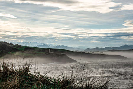 Landscape of the coast of the Cantabrian Sea in the town of Comillas in Cantabria (Spain), with the...