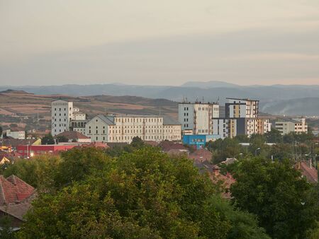 Alba Iulia, Romania - September 22, 2019: Industrial buildings near Alba Iulia railway stationのeditorial素材