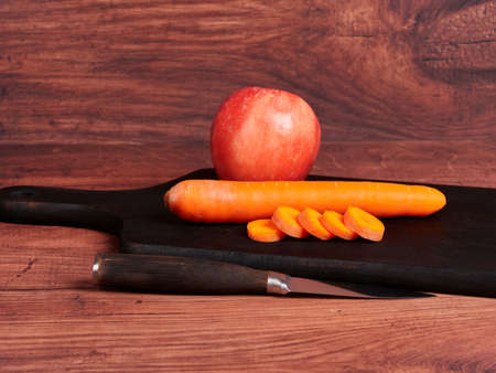 Apple and sliced carrots. Baby food concept.の写真素材