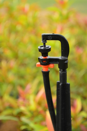 Sprinkle water for the flower gardenの写真素材