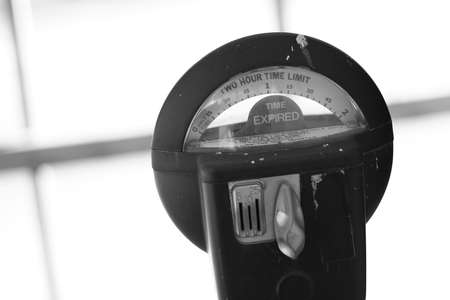 expired parking meter, white backgroundの写真素材