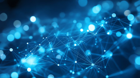 A blue abstract background with glowing lines and dots forming a network. The background has a blurred bokeh effect.の写真素材