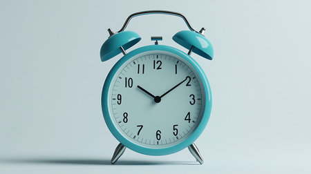 A blue analog alarm clock with silver accents on a light blue background. The time is 959.