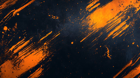 An abstract background with diagonal orange brush strokes and splatters on a dark background.の写真素材