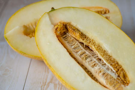 Top view of a melon close-up. Ripe melon with seeds in the cut.の写真素材