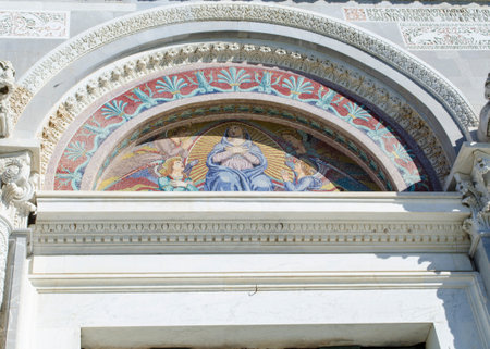 Fragment of the Pisa Cathedral in honor of the Assumption of the Blessed Virgin Mary, part of the ensemble of Piazza dei Miracoli. A significant monument of Romanesque architecture in Italyの写真素材