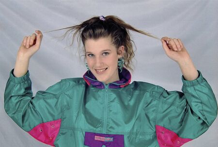 Young girl posing in a jogging outfitの写真素材