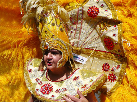 Unidentified woman dancer dressed in a multicolored feather carnival costume perform at the annual...