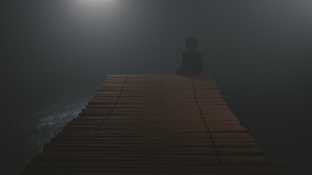 black man figure sitting on seaside bridgeの写真素材