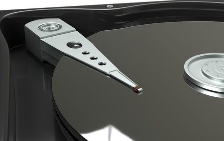 Closeup inside a hard disk drive HDD, magnetic surface and data reading mechanism 3d illustrationの写真素材