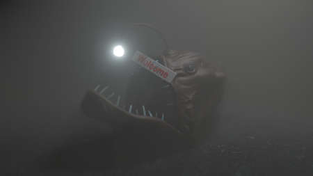 Angler fish on dark blue ocean water welcome trap 3d illustration.