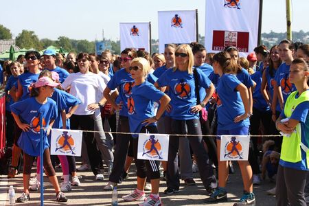 Traditional women's race held in september 2011. in Ada Ciganlija, Belgrade,Serbia,participants warming up before the startのeditorial素材