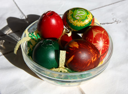 Multicolored painted and decorated Easter eggs on the table