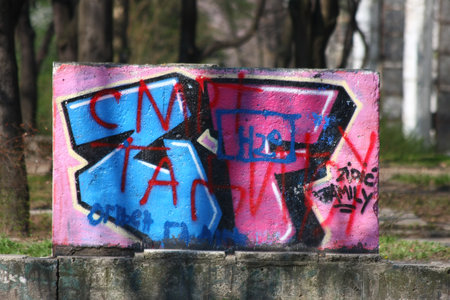 Graffiti on the stone blocks in public parkのeditorial素材
