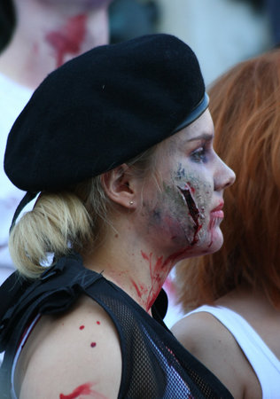 Participants with different masks in Zombie walk within reeling of the Festival of Serbian fiction movies held in Belgrade,Serbia,21.October2012.のeditorial素材