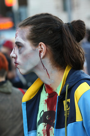 Participants with different masks in Zombie walk within reeling of the Festival of Serbian fiction...