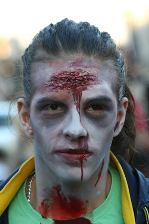 Participants with different masks in Zombie walk within reeling of the Festival of Serbian fiction movies held in Belgrade,Serbia,21.October2012.のeditorial素材