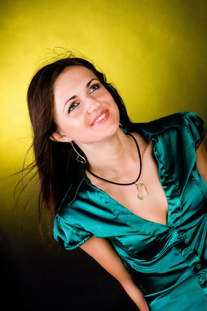 Portrait of the smiling girl on white backgroundの写真素材