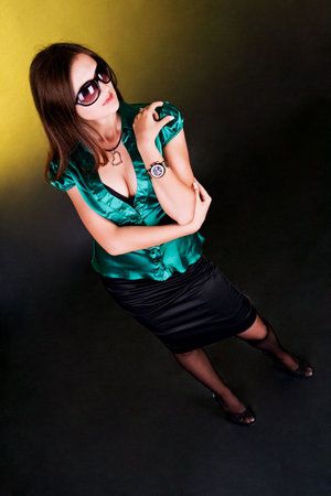 Portrait of a charming sexy brunettes with neck and glassesの写真素材