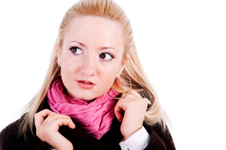 Portrait of pretty young blond girl in a coatの写真素材