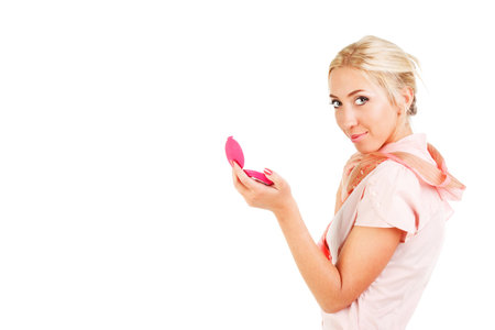 Picture of a young sweet pretty girl with powder box on white background.の写真素材
