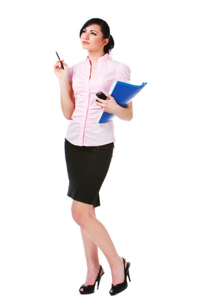 Picture of a attractive young girl in pink blouse and black skirt on white background.の写真素材