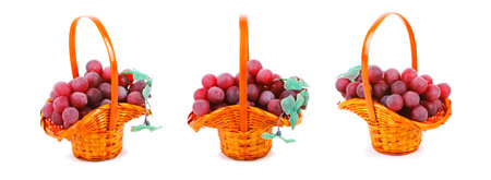 Picture of three baskets of grapes on white backgroundの写真素材