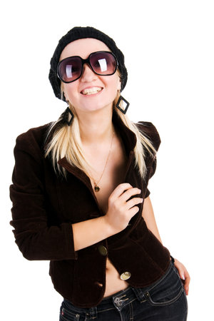 Picture of a beautiful alluring young girl in jacket with sunglassessの写真素材