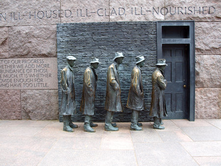 statues of unemployed men standing in a bread line during the Great Depression at the FDR Memorial in Washington, D.C.の写真素材