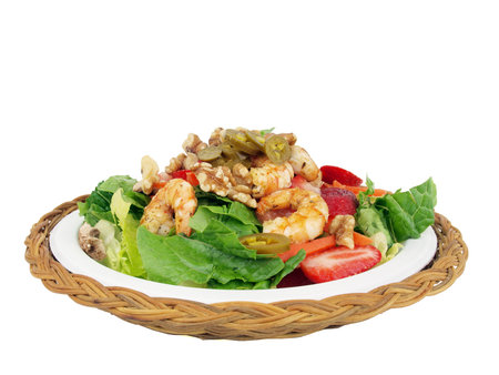 healthy salad of shrimp, lettuce, tomato. onion, pepper, walnuts and jalapeno on a white backgroundの写真素材