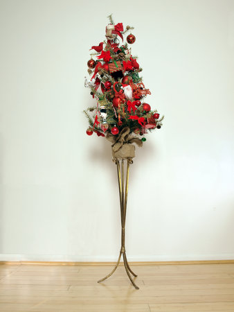 unique display of a miniature x-mas tree in the room of a homeの写真素材
