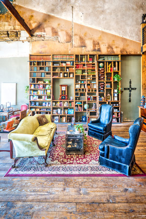 A cozy room in Intermission Bookshop of Brownwood, Texas featuring stylish furniture and inviting interior design.の写真素材