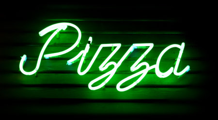 "pizza" inscription on the wall of pizzeriaの写真素材