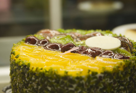 close up of cake with jam. there is little blank label on the cake for your info