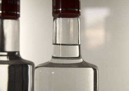close up of two bottles with vodkaの写真素材