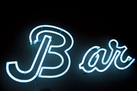 neon inscription on the wall of cafeの写真素材