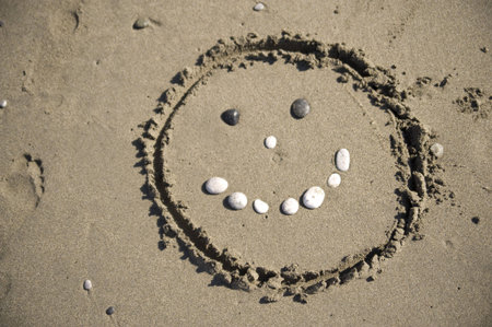 smiley on sandの写真素材