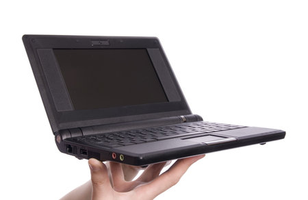 little black notebook on arms of woman isolated on white. on keyboard there are Roman and Cyrillic...