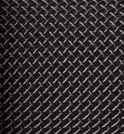 macro of black microphone surface. may be use like backgroundの写真素材
