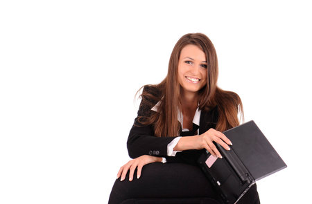 beautiful smiling businesswoman with laptop isolated on whiteの写真素材