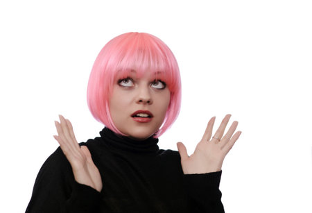 young woman with pink hairs isolated on whiteの写真素材